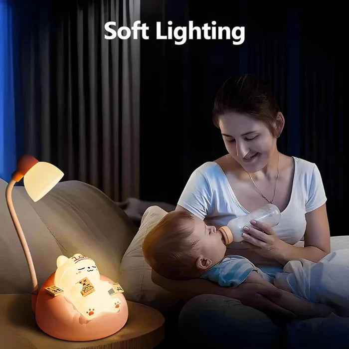 Cat night light with soft warm glow beside couch, seated cat figure on round base