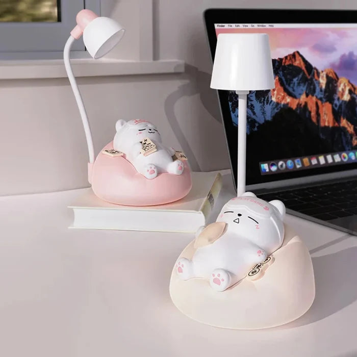 Cat night light with white lamp head and pink base, shelf display