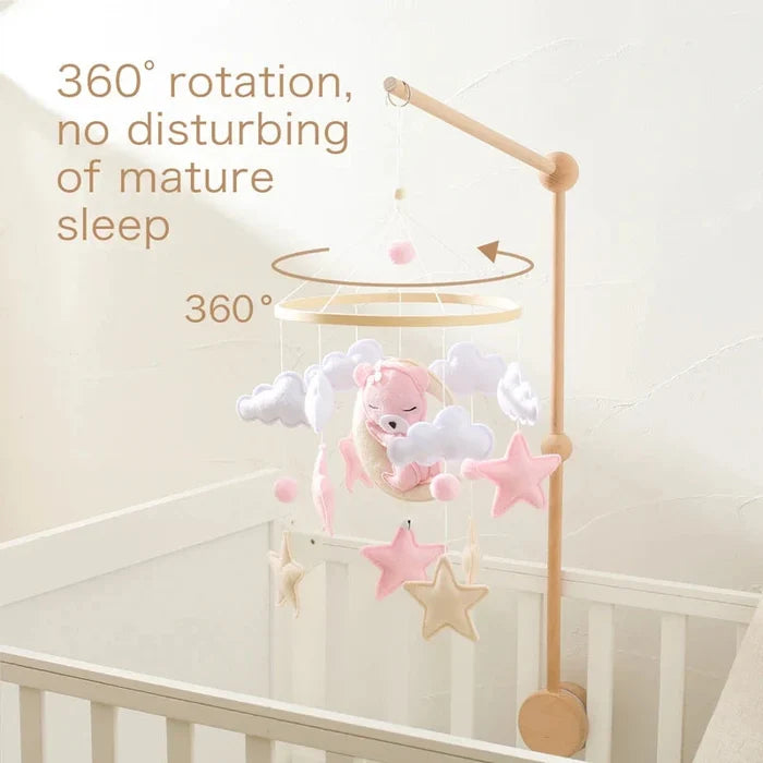 Wooden crib mobile with 360-degree rotating ring and felt bear, clouds, and star charms