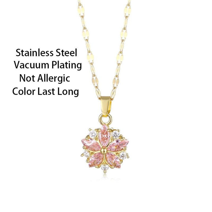 Gold-tone pendant necklace with pink cherry blossom flower and crystal studs, full chain