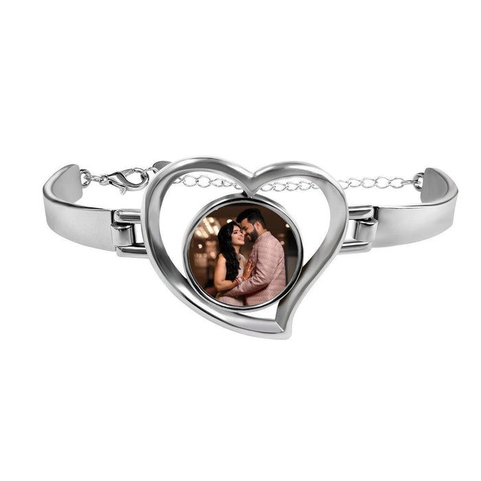 Heart-shaped photo bracelet with silver-tone frame and inset heart portrait
