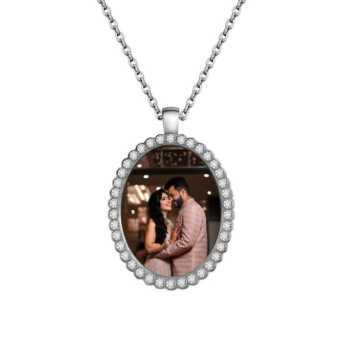 Silver photo oval pendant necklace with rhinestone bezel and couple photo