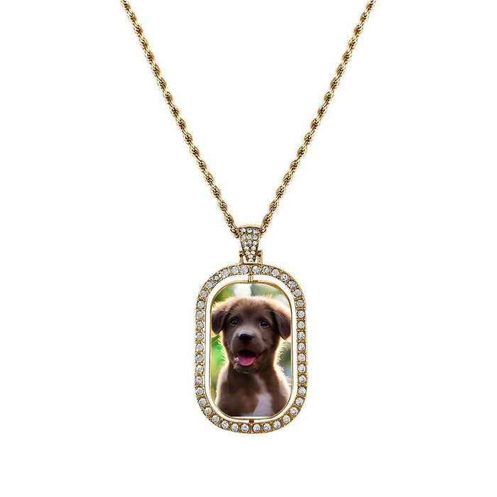 Gold photo pendant necklace with oval dog portrait charm and rhinestone border