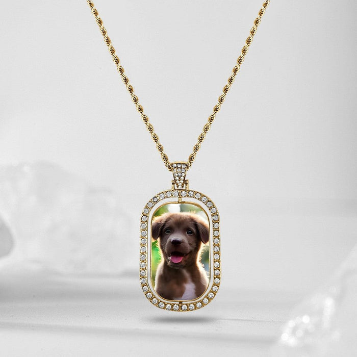 Gold oval photo pendant necklace with dog portrait in rhinestone frame
