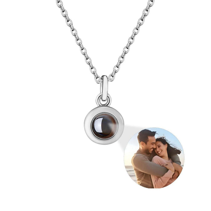 Silver round projection pendant necklace with chain and clear window
