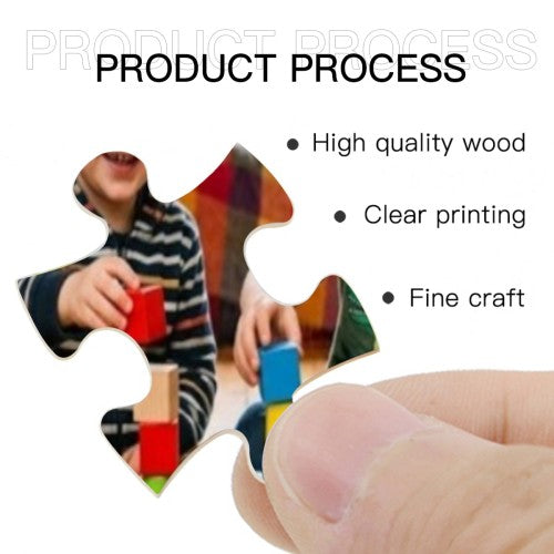 Wooden jigsaw puzzle pieces and a fingertip guiding a cut-out piece into place
