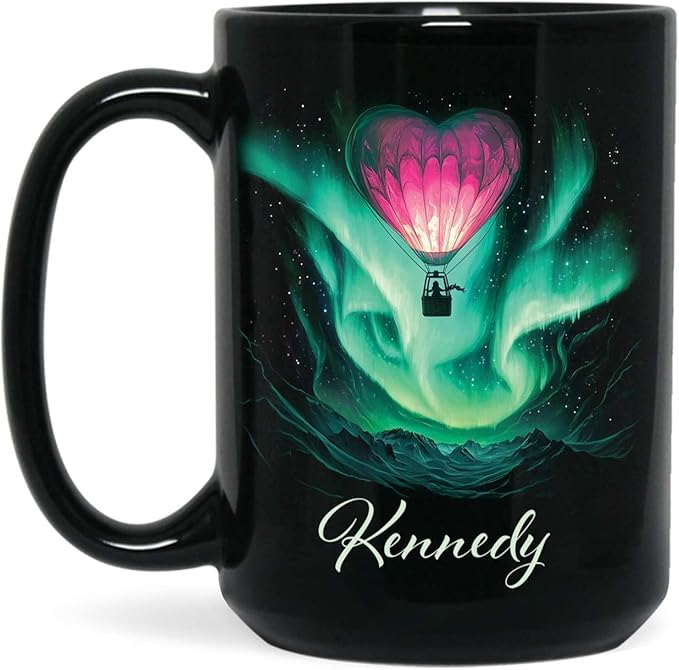Black ceramic coffee mug with green aurora hot air balloon heart design and name Kennedy