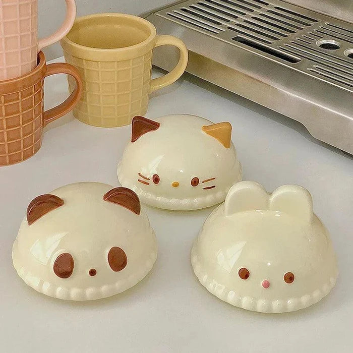 Animal ice cream mug set with cat, panda, and bunny faces in cream and yellow colors