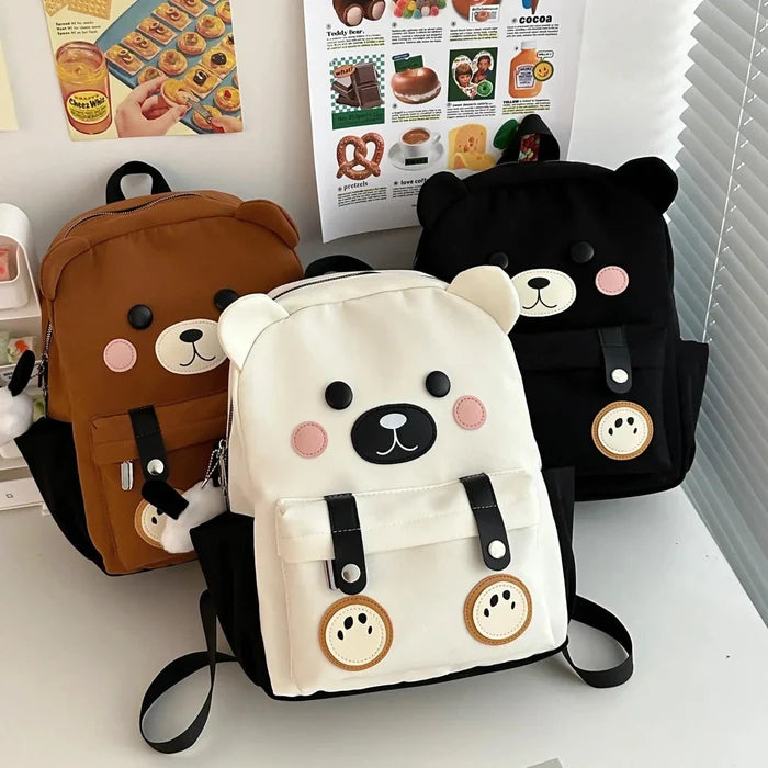 Cute bear backpack set with brown, white, and black mini bags, each with bear-face front