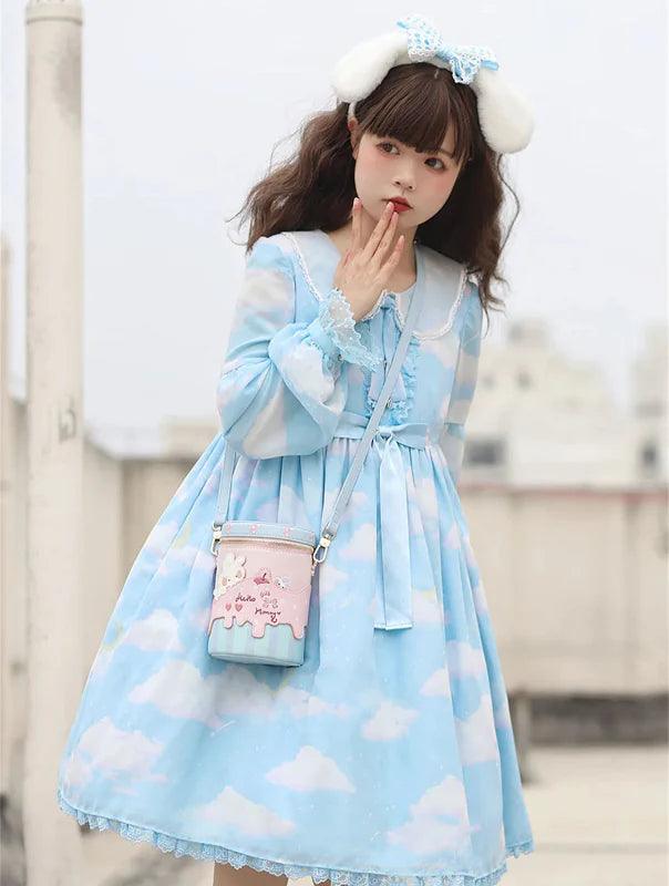 Small pink and light blue bunny bucket bag with gold hardware and adjustable strap