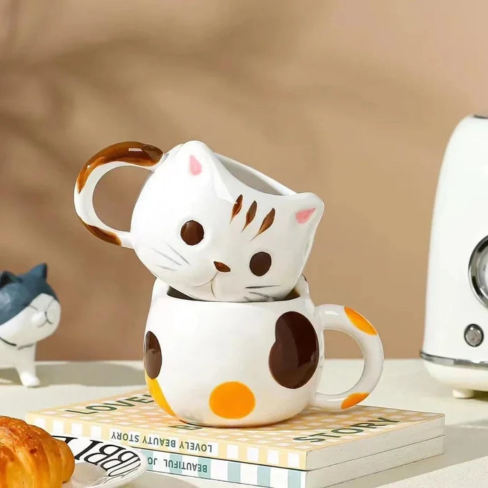 Cat ceramic mug, white with orange spots and brown face patches, cute whisker detail
