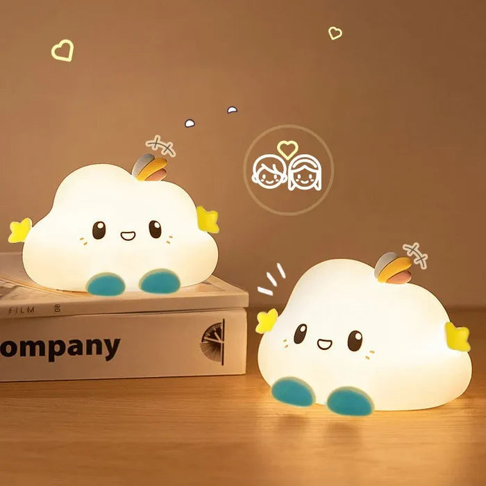 Cloud LED night light on a box, with rainbow horn and yellow star details.