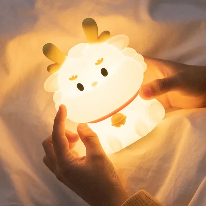 Cute dragon night light with large horns and round face, glowing LED light