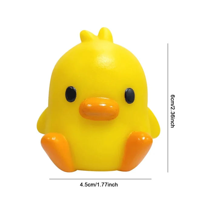 Yellow duck night light with orange beak and black eyes, 6.2 cm tall