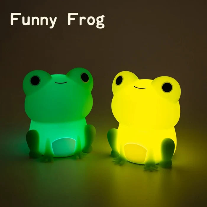 Silicone frog night lights, green and yellow glowing frogs side by side