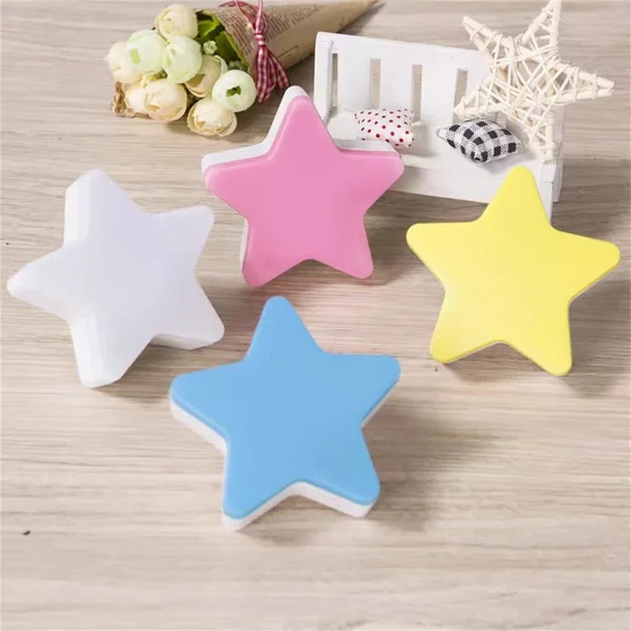 Set of star plug-in night lights in pink, yellow, blue, and white