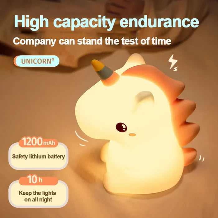 Warm-glowing unicorn LED night light with horn and round belly