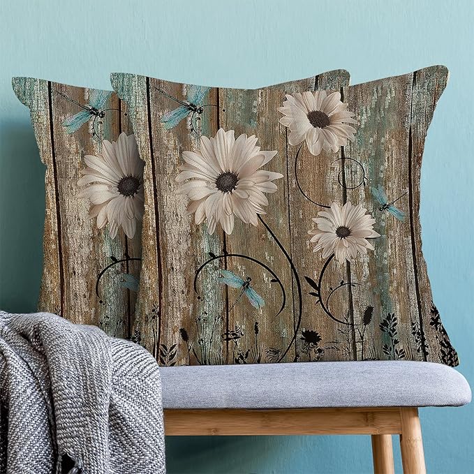 Floral square pillow cover with wood-plank print, daisies, turquoise dragonflies, black vines