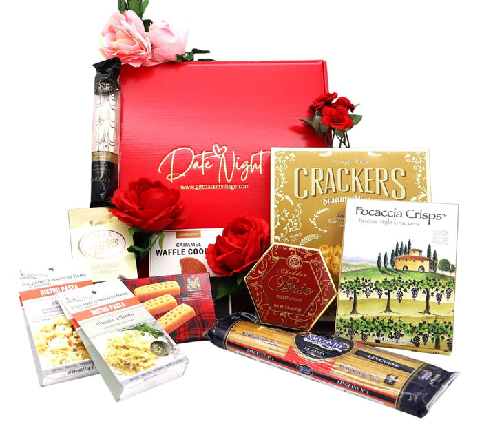 Red gift box set with crackers, wafers, and rose-topped decorations