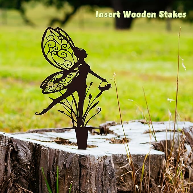 Dark metal fairy garden stake with large winged fairy silhouette and swirled dress
