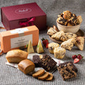 Deluxe Pastry and Tea Gift Set with cakes, cookies, and herbal tea boxes