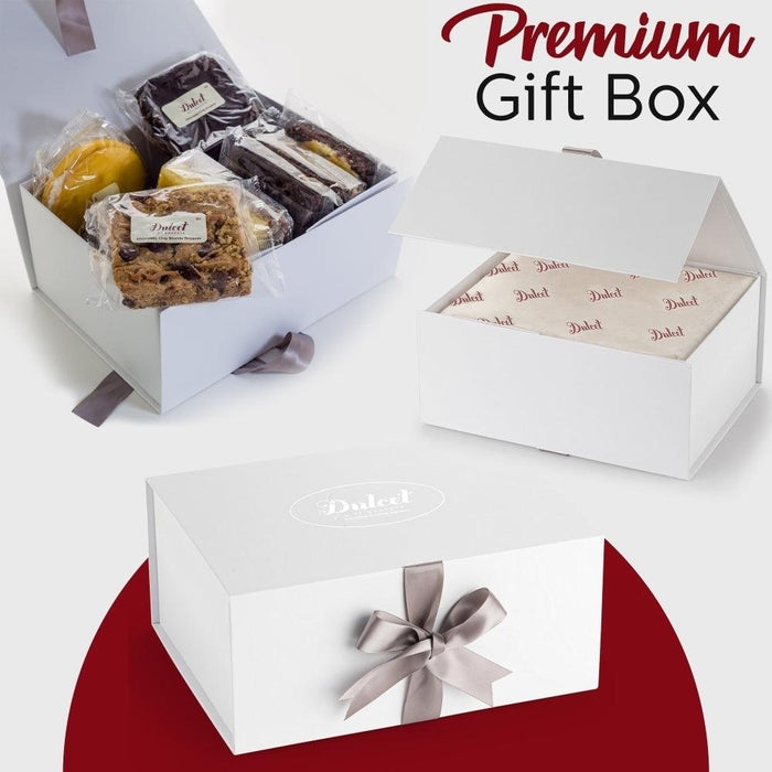 White premium gift box with ribbon bow and wrapped pastries inside
