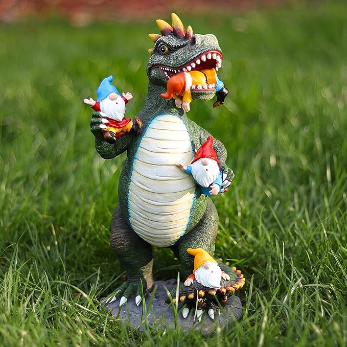 Roaring green dinosaur gnome statue with white ribbed belly and three red-hatted gnomes