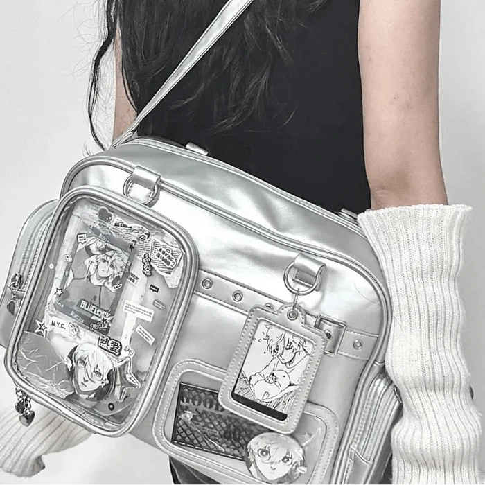 Silver pastel crossbody bag with clear window pockets and card-shaped front charm