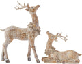 Two resin reindeer figurines, one standing with antlers, one lying down, brown