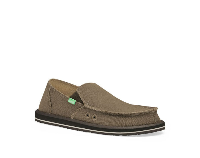 Sanuk Vagabond slip-ons in brown canvas with frayed edges, dual elastic panels, and a black outsole, side view.