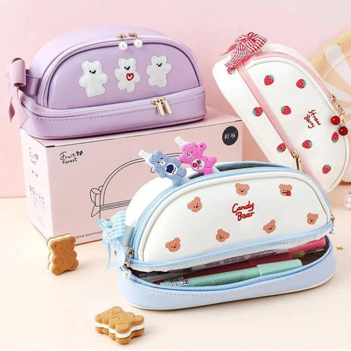 Lavender double-compartment pencil bag with bear charms and two zipper closures.
