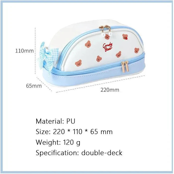 Light blue and white double-compartment pencil bag with bear pattern and Candy Bear logo.