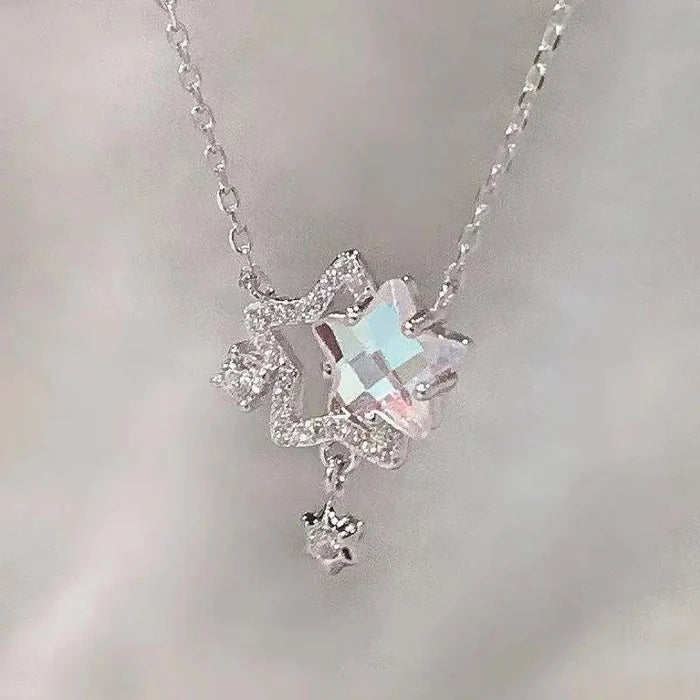 Rhinestone star pendant necklace with blue square gem and dangling star charm