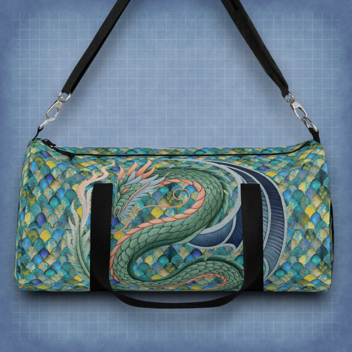 Mermaid-scale duffel bag with green dragon graphic, black straps and handles