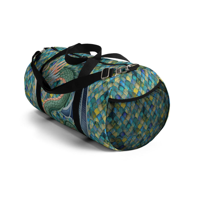 Mermaid-scale duffel bag with dragon artwork and top carry strap, black accents