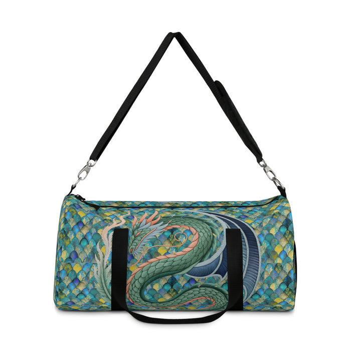 Mermaid-scale duffel bag with teal and green scale pattern, black shoulder straps