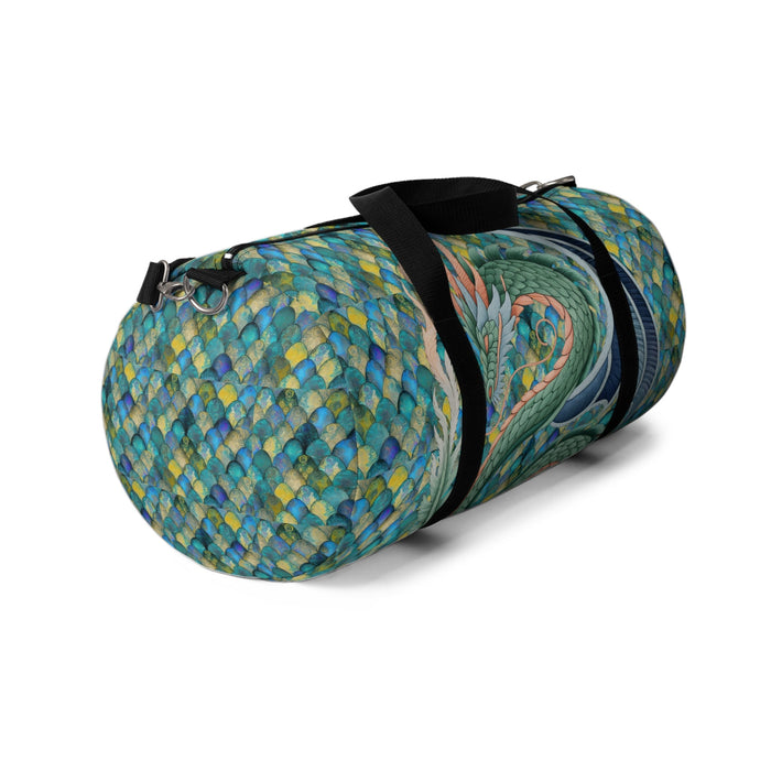 Round mermaid-scale duffel bag with green dragon graphic, black strap and buckles