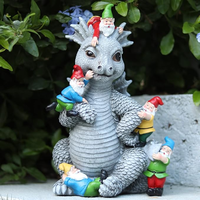 Light gray dragon gnome garden statue with tiny gnomes perched on its back
