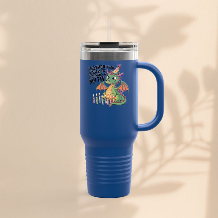 Insulated travel mug with royal blue body, dragon graphic, and clear lid