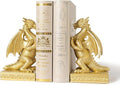 Gold dragon bookends with two dragon statues and decorative book spines