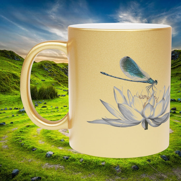 Metallic gold mug with dragonfly and lotus design, curved handle