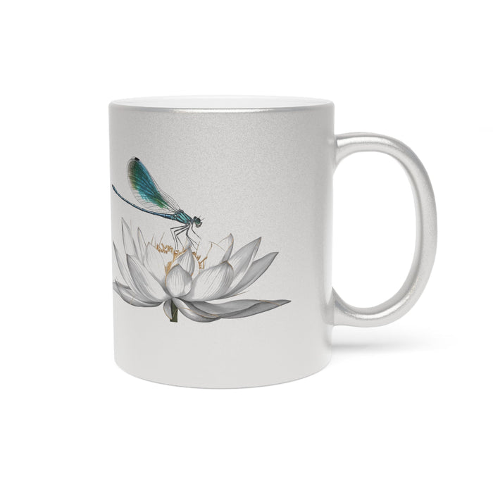 Metallic silver mug with centered dragonfly and lotus artwork, round handle