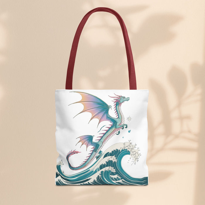 White tote bag with teal waves and dragon print, burgundy red handles