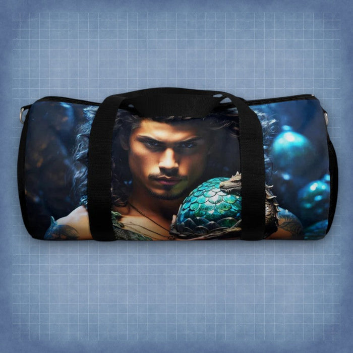 Blue dragon-egg duffel bag with black handles and front portrait artwork.