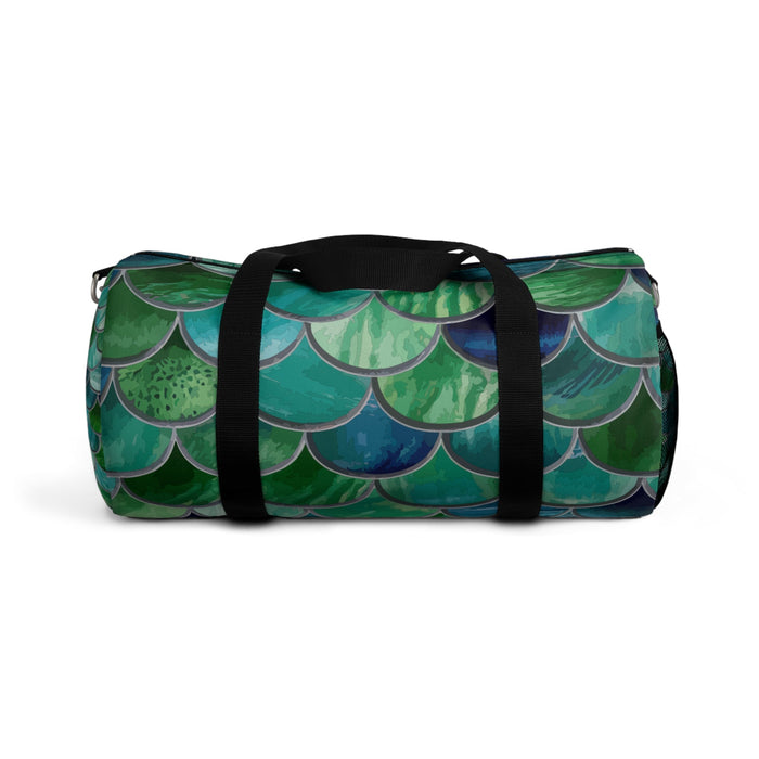 Mermaid-scale duffel bag, green and blue scale print with black straps