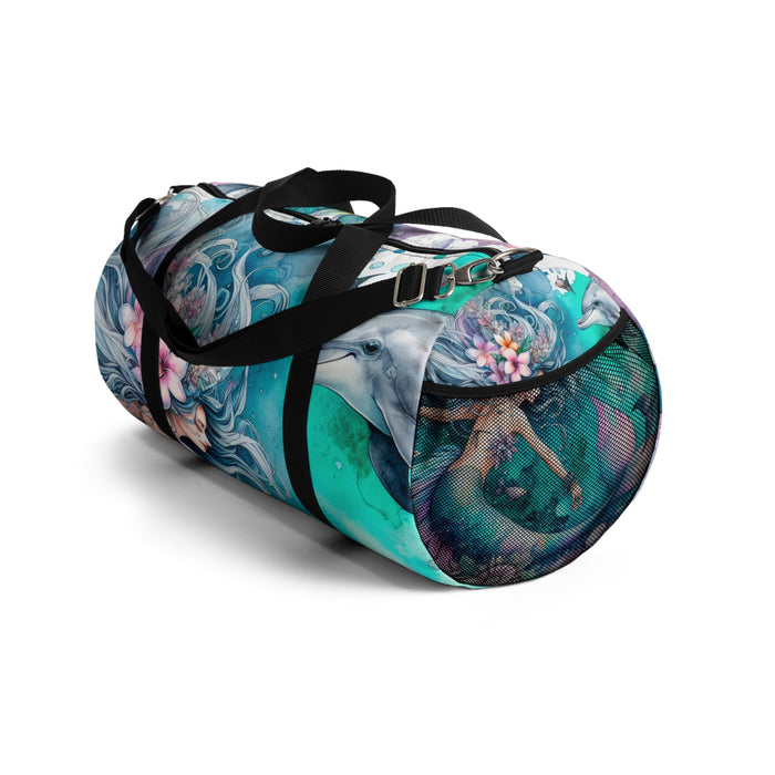 Mermaid print duffel bag with black crossbody strap and front zip closure