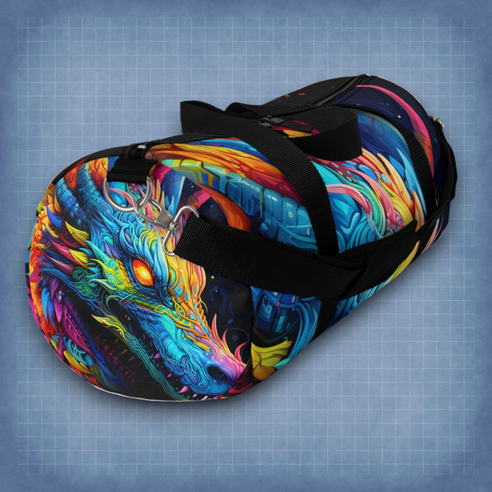 Neon dragon duffel bag with black webbing handles and colorful graphic on the body.