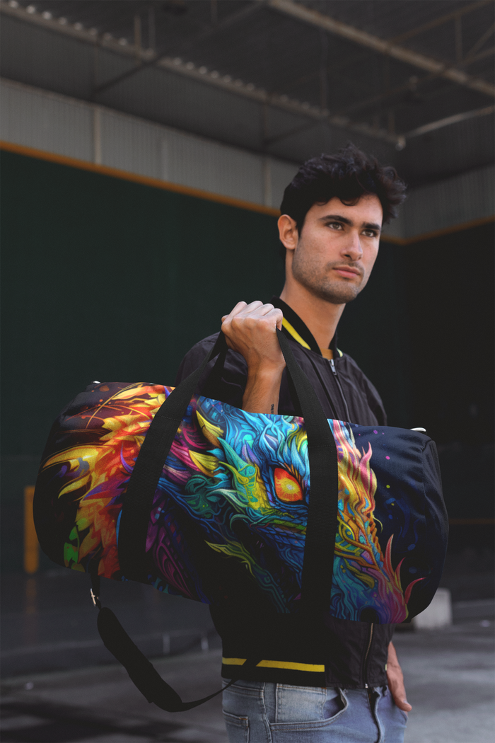 Neon dragon duffel bag held by a person, featuring black straps and bold blue dragon print.
