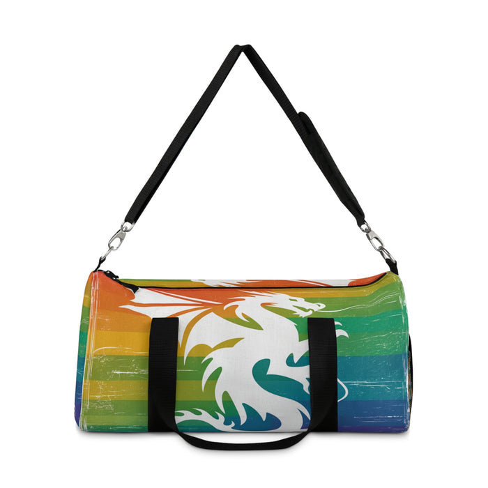 Multicolor striped duffel bag with dragon graphic, black shoulder strap and metal hardware.