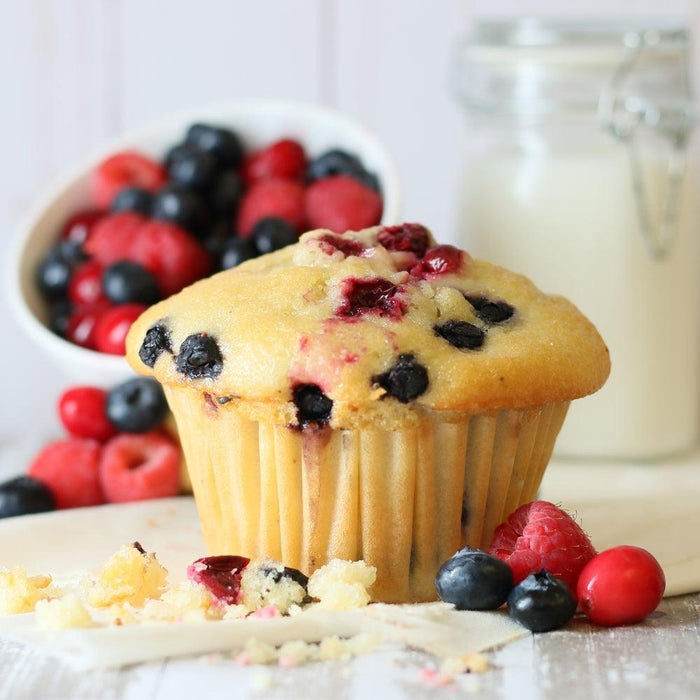 Single berry muffin with blueberries and raspberries, plus crumb topping